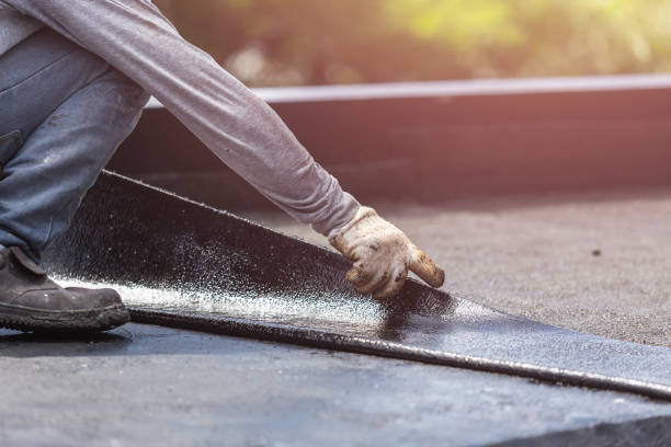 Professional Basement Waterproofing technician working in Rothschild, WI